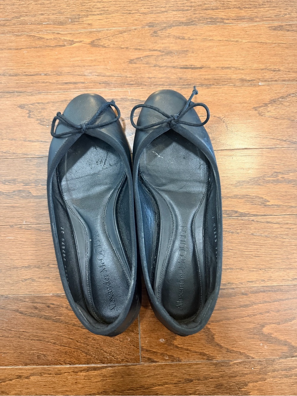 Alexander McQueen Black Leather Ballet Flats with Bow Accent